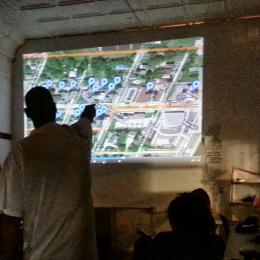 Digital Stewards present plans for mesh networks in the Detroit Future Media training lab.