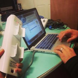 Detroit Digital Stewards flashing Commotion Wireless software onto routers