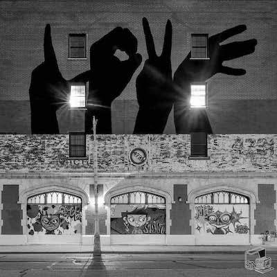 black-and-white image of the LOVE building murals